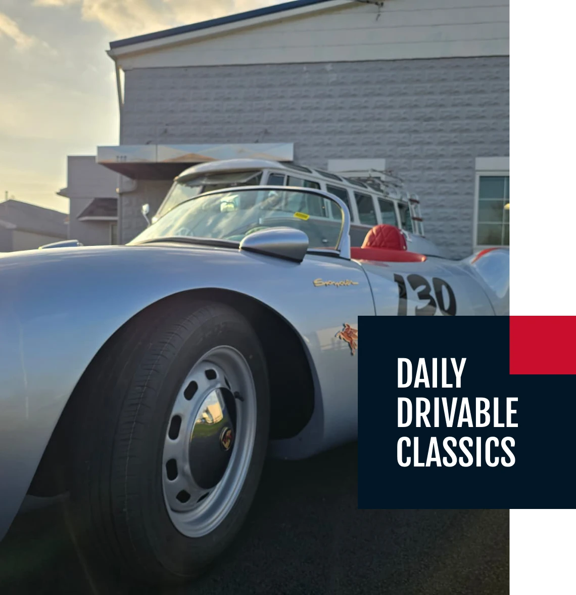 Classic silver convertible car with number 130.